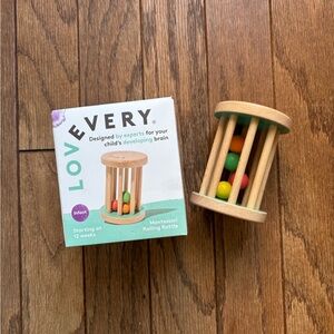 Lovevery Montessori rolling wood rattle